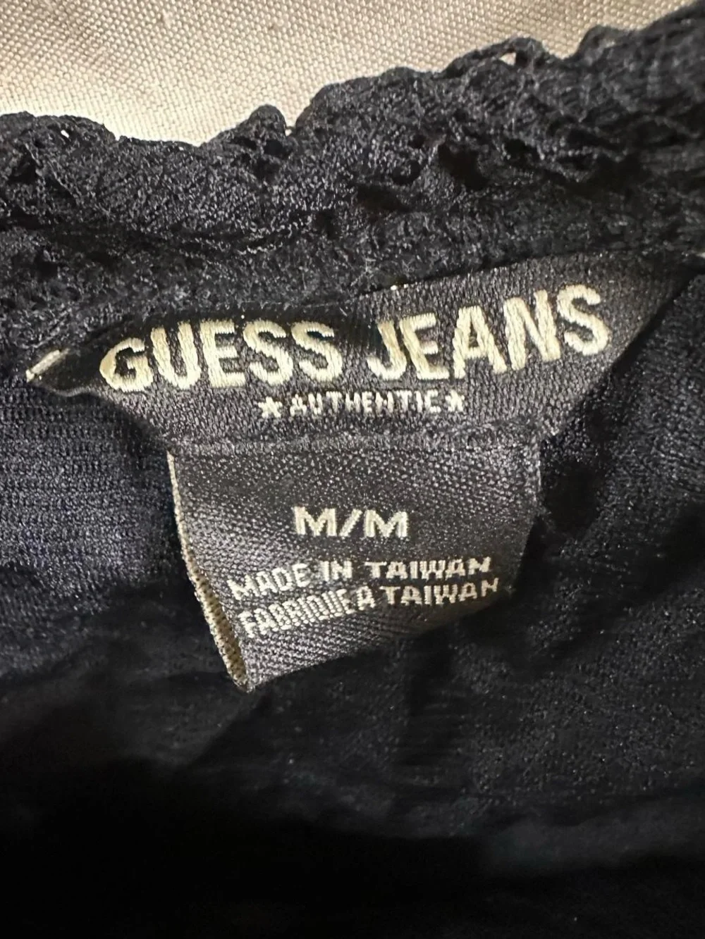 Guess branded Black frilly short midi skirt.